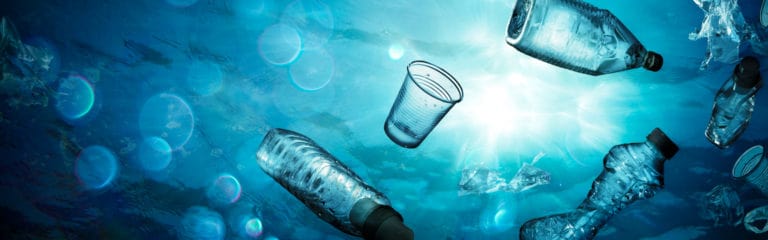 Plastic cups floating in water